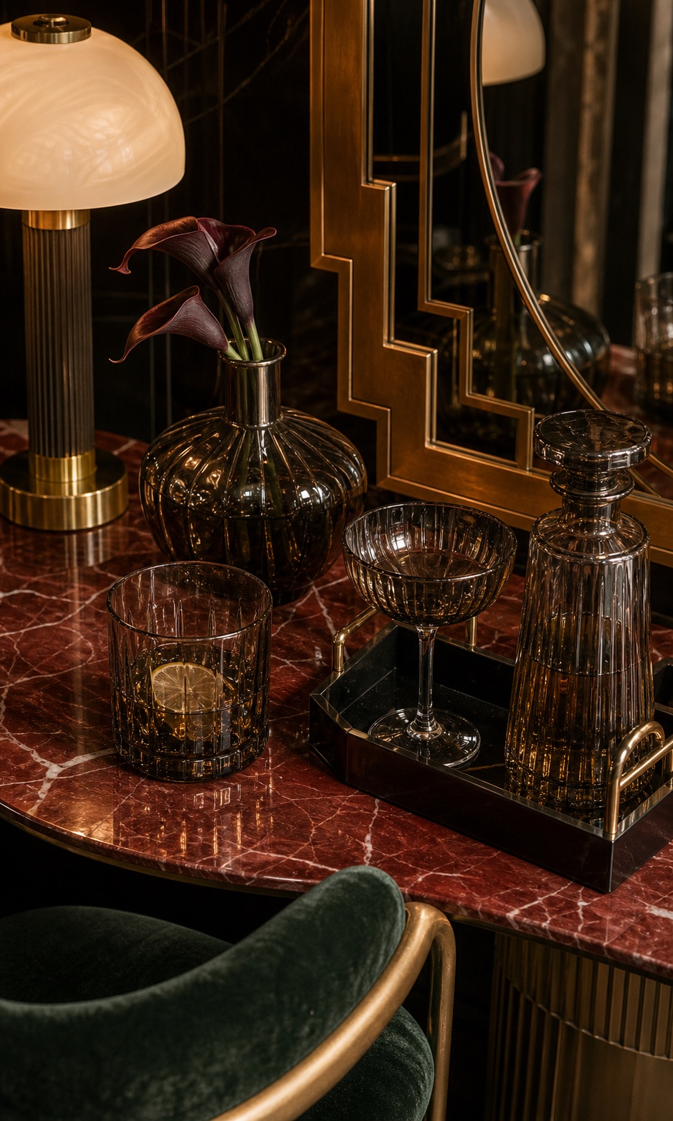 Art deco dining corner with brass and green chairs